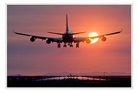 Premium poster Aeroplane landing at sunset